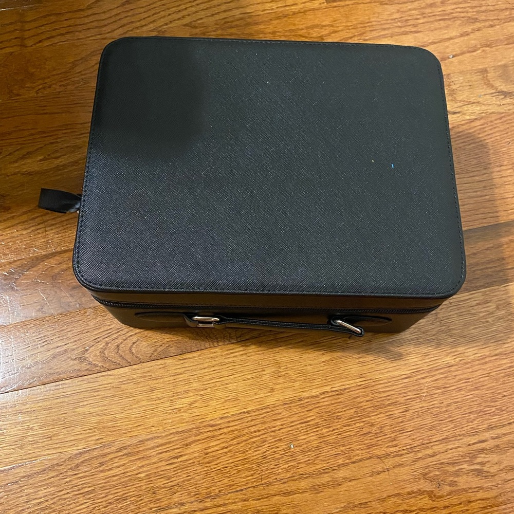 NWOT, makeup carrier with mirror and lights.